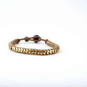 African Snake Vertebrae on Brown Leather Cord with Pearl button closure