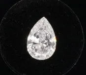 0.60CTW PEAR DIAMOND SI2/G