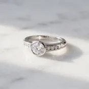 Bezel-Set Diamond Ring with Channel Accents in Platinum