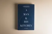 “A Man and His Kitchen” Hardback Book (SIGNED)