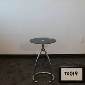 18" round black glass occasional table with tunular chrome base