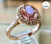 14 karat Rose Gold ring with Padparadscha (Padperajah) Sapphire and 38 diamonds