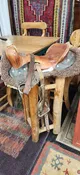 Antique Leather Saddle on Wood Tall Stand