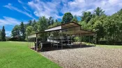 38x25x12/8 Metal Barn with 12' Lean-To - Vertical Roof - Eagle Carports