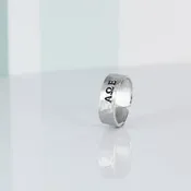 Alpha Omega Epsilon Infinity Ring