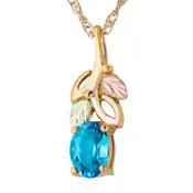 10k Blue Topaz Pendant with Black Hills Accents