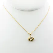 4 Invisible Set Diamonds in White Gold Framed in Yellow Gold Rhombus Shape