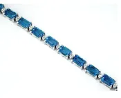 14k white gold baguette blue topaz and diamond bracelet