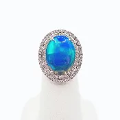 6.49ct Opal Oval Ring with 0.89 ct Double Diamond Halo