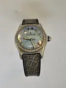 Corum Bubble Serial # 745080 Model # 39.151.47 Movement caliber and serial # ETA Quartz