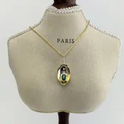 High Grade Turquoise Set in a Polished Bowl Pendant, Gold Filled over Sterling Silver w/Chain is a gold filled chain, 18" long