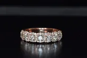 14 Karat Rose Gold diamond band with halo