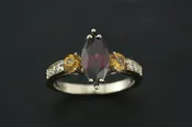 14K gold Marquise garnet, yellow sapphires and natural diamond ring. Designed at Stark Jewelers — Stark Jewelers