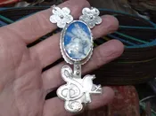 BM CHARMED — BELOW THE CLOUDS