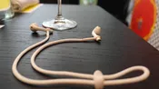 NEW EARBUDi Cord for AirPods - Grips on and off Your Apple wireless AirPods | Soft 22" Cord Securely Holds AirPods around your neck