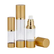 JS MG  | GOLD & CLEAR AIRLESS BOTTLE