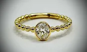 0.51 Carat G/H Vs2 Oval Solitaire Ring w/ Beaded Shank