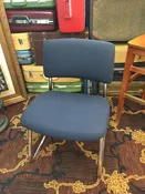 Steelcase guest chair waiting — HOTEL TO HOME