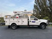 Bucket truck Service — VOLTA SIGNS UNLIMITED
