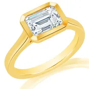 East West Emerald Bezel Engagement Ring